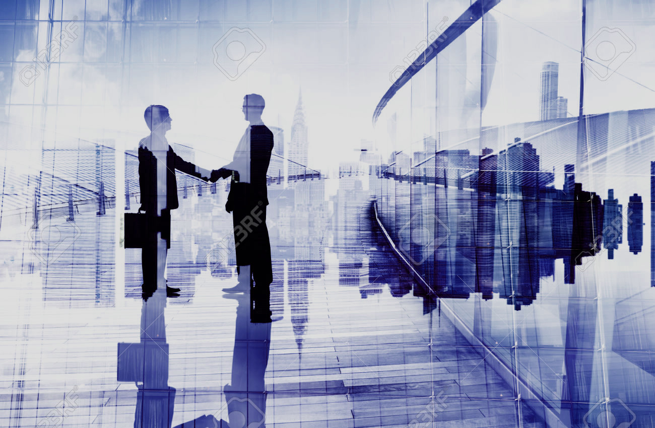 34402958-Silhouettes-of-Two-Businessmen-Having-a-Handshake-Stock-Photo.jpg